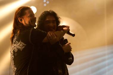 John Payne and Robin McAuley, right, goof around after performing with other band members during song rehearsal for “Raiding the Rock Vault” in the LVH Theater at LVH on Wednesday, March 6, 2013.